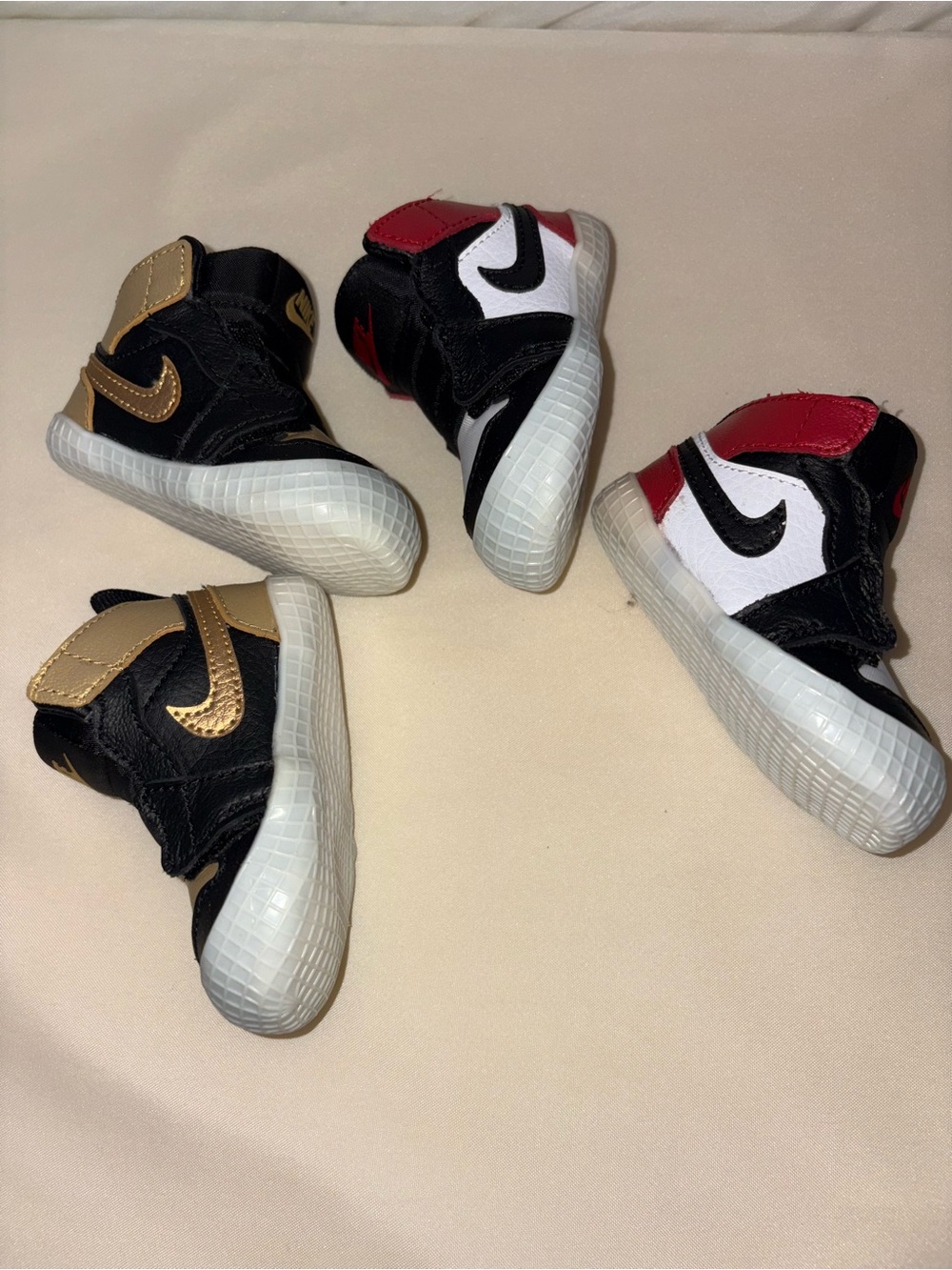 Crib soft bottom Jordans in Black, Gold & Black, Red